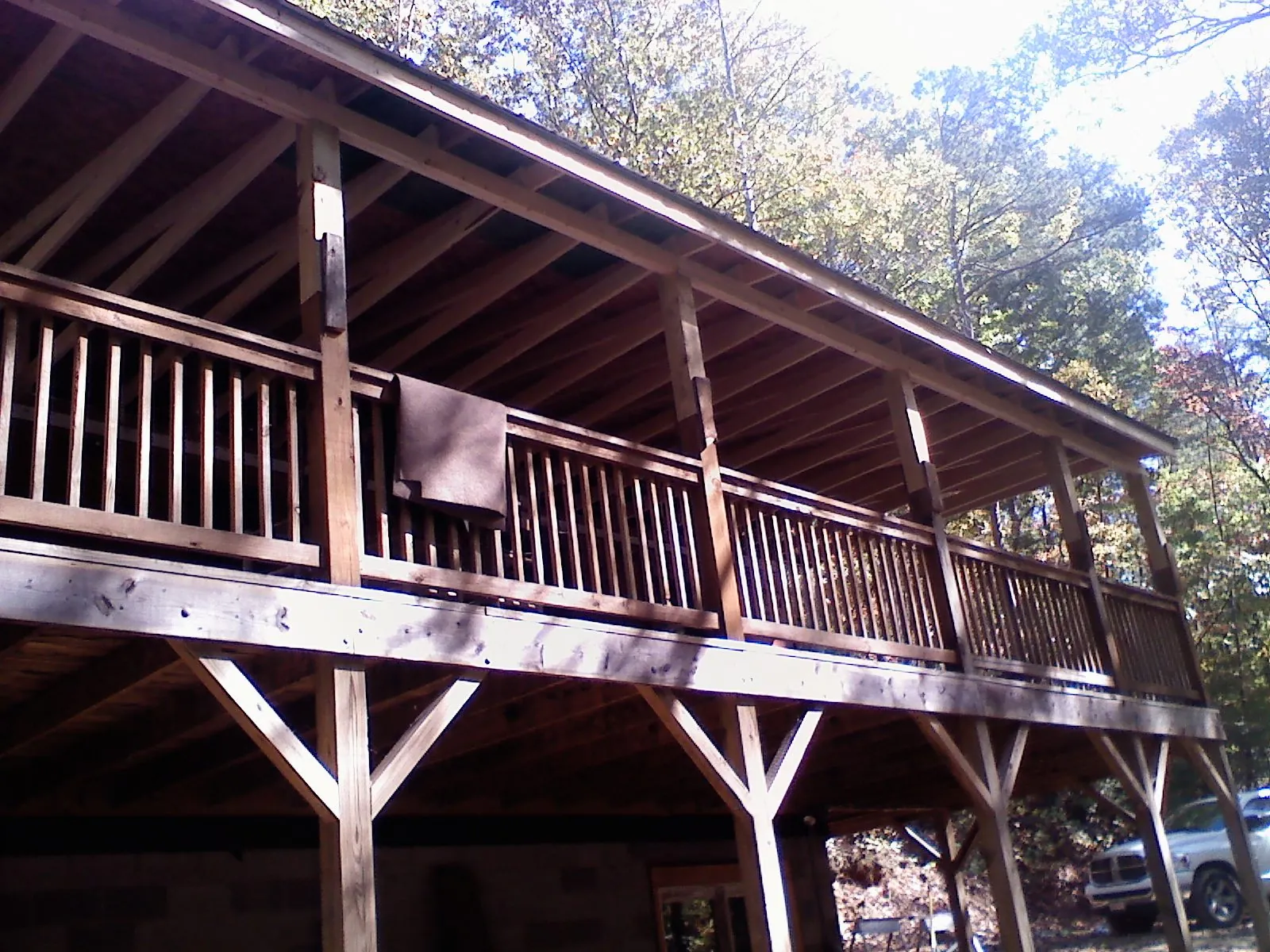 Timber framing under a new elevated porch and deck — Roof Leak Repair in Alexis by Roofing Brothers